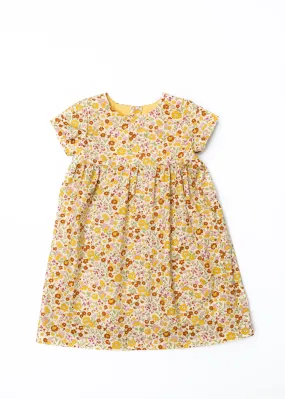 The Dolly Dress in Mustard Floral The Dolly Dress in Mustard Floral